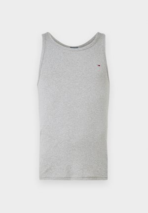 Šedý tílko vyrobené z bavlněné směsi, s kulatým výstřihem a malým logem na levé straně hrudi. Hladká textura.