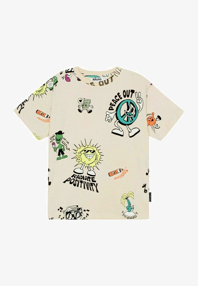 T-shirt beige avec des graphismes de dessins animés colorés comprenant un symbole de paix, un soleil souriant, un extraterrestre avec une glace, et des phrases telles que "Peace Out" et "Rayonne la positivité".