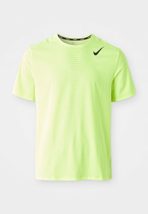 Camiseta atlética de manga corta verde neón hecha de un tejido texturizado y transpirable. Presenta un logo negro de Nike en la parte superior izquierda del pecho.
