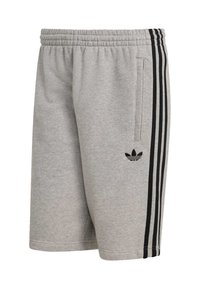 Sivé športové šortky z textúrovaného materiálu, s elastickým pásom, bočnými vreckami a čiernym dizajnom s tromi prúžkami po bokoch. S logom.