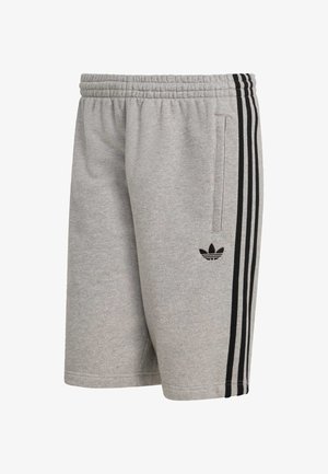 Gray athletic shorts with a textured fabric, elastic waistband, side pockets, and black three-stripe design along the sides. Features logo.