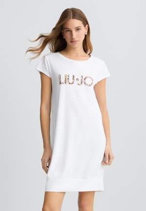 Rochie albă din bumbac cu mâneci scurte și o croială lejeră. Prezintă inscripția "LIU JO" embellisată cu un model floral pe față.