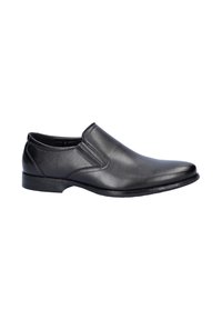 Black leather slip-on shoe with a smooth texture, rounded toe, elastic side panels, and a low rubber heel.  Simple design with minimal accents.