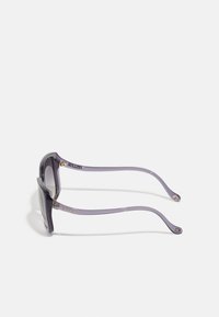 COACH Akiniai nuo saulės - transparent violet