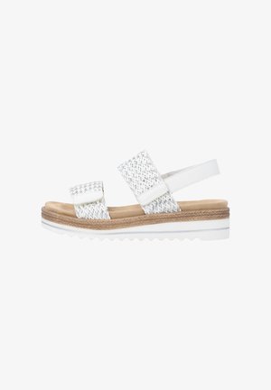 White open-toe sandal with two adjustable woven straps, tan cushioned footbed, and white sole with ridged bottom for grip.