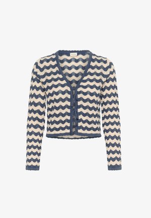 Cardigan hibrida dengan pola bergelombang, rajutan terbuka dalam warna krim dan biru navy. Memiliki leher V, lengan panjang, dan penutupan kancing di bagian depan dengan tali.