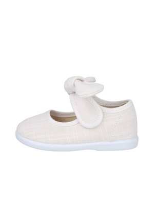 Zapato Mary Jane blanco para bebé con lazo de tela y cierre de gancho y bucle, parte superior texturizada y suela blanca flexible, mostrado en vista lateral.