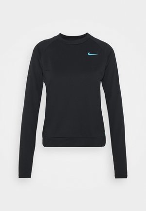 T-shirt de sport noir à manches longues avec col rond et petit logo Nike bleu en haut à gauche de la poitrine.