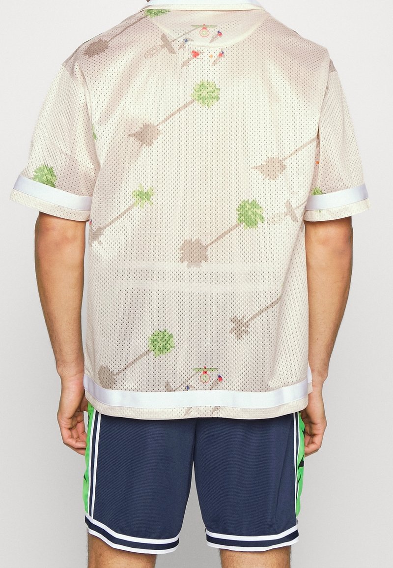 Nike Performance T-Shirt print beige (Pre-owned) Zalando