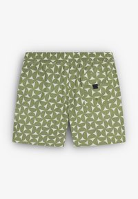 Pantaloni scurți de baie verzi, cu un model geometric alb, talie elastică și un buzunar pe spate cu un mic eticheta neagră.