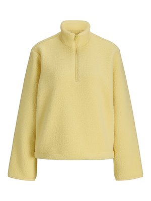 Pull en polaire jaune doux avec manches longues, col montant et fermeture éclair partielle au centre devant.
