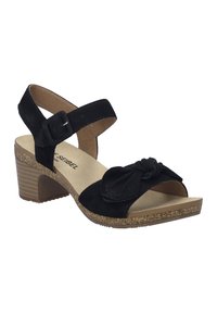 Sorte ruskindssandaler med en knyttet sløjfedetail, justerbar ankelrem og en korkbeklædt hæl. Har en lukket tå og en glat fodseng.