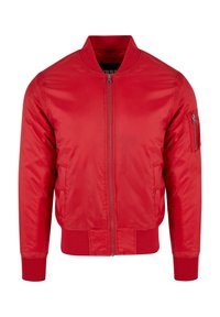 Giacca bomber rossa con chiusura con cerniera, colletto a coste, polsini e orlo. Presenta una tasca sulla manica con cerniera e un tessuto liscio e lucido.