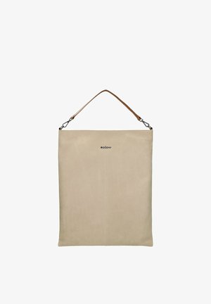 Beige leren tote bag met een dunne bruine schouderband, met een strak design, minimale stiksels en een klein logo aan de voorkant.