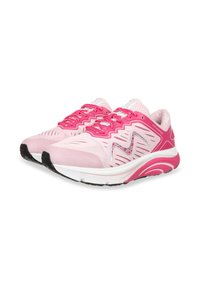 Pink athletic shoes with mesh upper, textured design, and contrasting white and black sole. Features prominent lacing and logo detail.