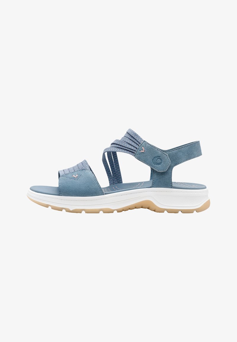 Sandale de sport bleue avec bride arrière réglable, bandes élastiques à l'avant, semelle rembourrée et semelle extérieure beige crantée, vue de côté.