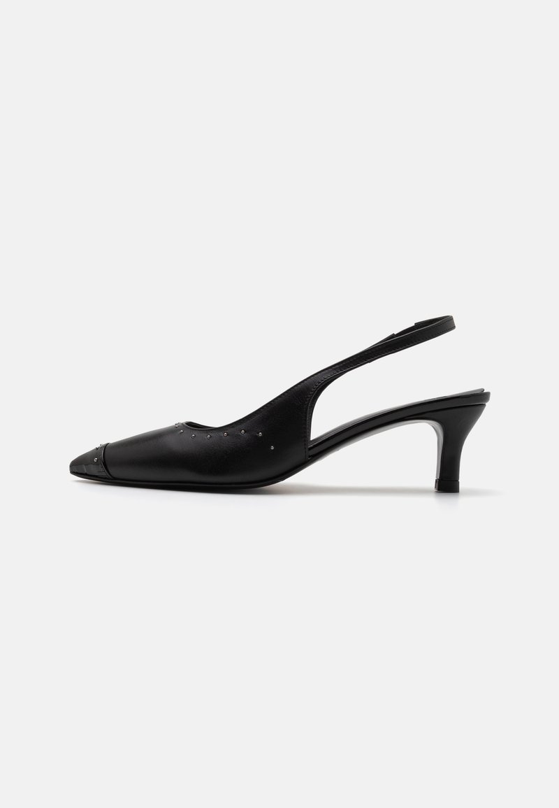 Black leather slingback heels with pointed toes, subtle studs along the side, and a low, block heel. Smooth texture and minimal design.