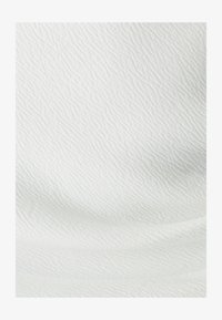 Seleccionado, white