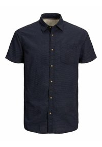 Camisa de botones de manga corta azul marino con pequeños puntos blancos y un bolsillo en el pecho.