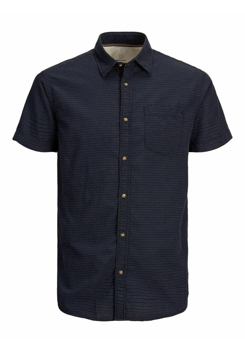 Camisa de botones de manga corta azul marino con pequeños puntos blancos y un bolsillo en el pecho.