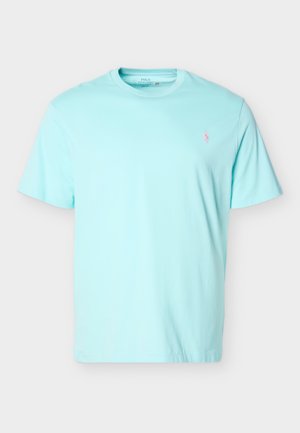 T-shirt bleu clair à manches courtes avec col rond et petit logo Polo Ralph Lauren rose brodé sur la poitrine gauche.