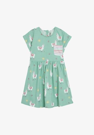 Mintgrünes Kleid mit Lama-Druck, kurzen Ärmeln und einer gestreiften Tasche. Ausgestellter Rock mit floralem und Sonnenmuster. Weiches Baumwollmaterial.