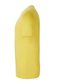 Geel katoenen T-shirt met korte mouwen en een klassieke ronde hals. Vloeiende textuur, rechte snit en geen zichtbare patronen of accenten.