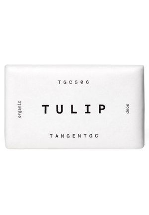 Riegel der Tulip Bio-Seife, eingewickelt in weißes Papier mit schwarzem Text, Produktcode TGC506, von der Marke TangentGC.