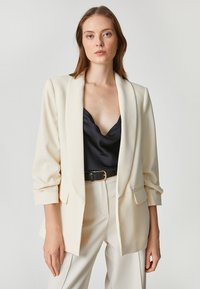 Koton 3/4 SLEEVE POCKET DETAIL - Kort kappa / rock - ecru