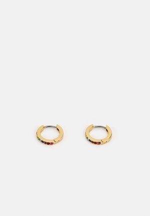 Small gold hoop earrings with a row of multicolored gemstones set on the front side.