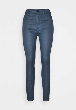 Dark blue jeans with a slim fit, crafted from denim fabric, featuring a front button closure and five pockets for storage.