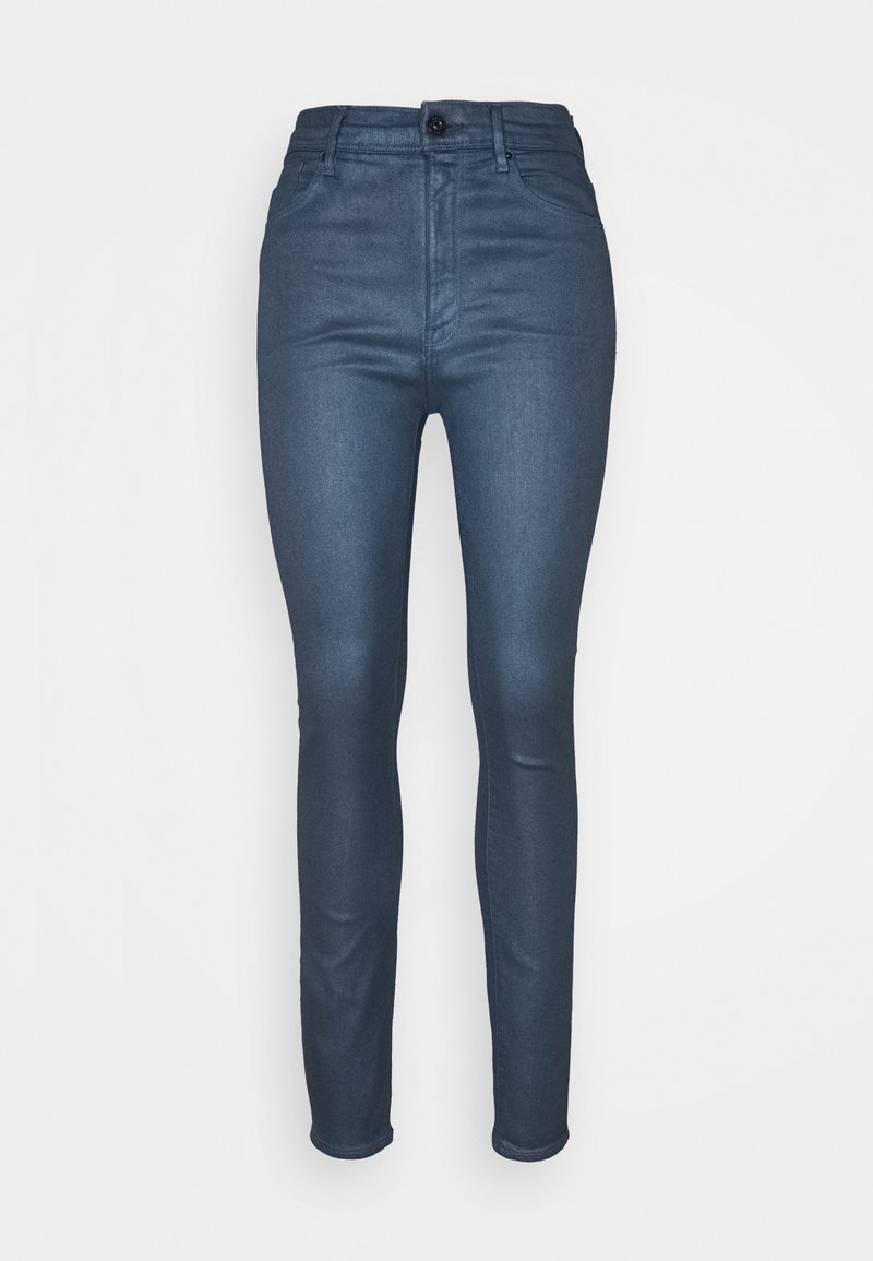 Jeans de color azul oscuro con un corte Slim, confeccionados en tela de denim, con cierre frontal de botón y cinco bolsillos para almacenamiento.