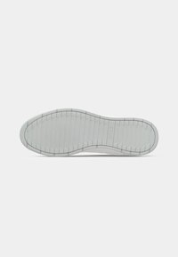 Talpa de cauciuc albă cu striații orizontale și verticale, suprafață netedă și o ușoară curbă la vârf, având un design curat și minimalist.