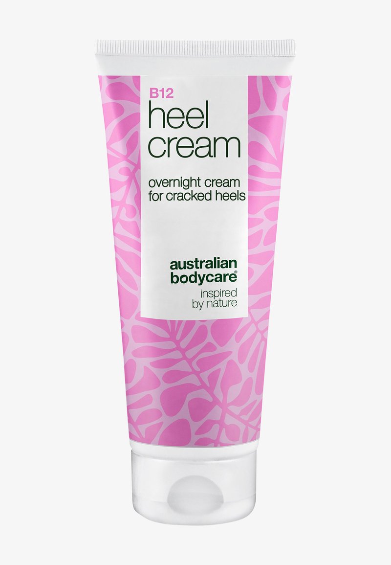 Tube de crème pour talons B12 avec un motif de feuilles roses, étiquetée comme crème de nuit pour talons crevassés par Australian Bodycare.