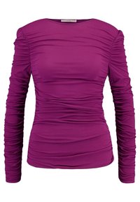 Lila Langarmshirt mit figurbetonter Silhouette, verziert mit gerafften Stoffdetails und einem runden Ausschnitt. Hergestellt aus weichem, elastischem Material.