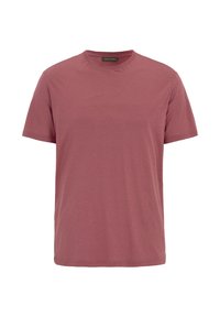 T-shirt a maniche corte di colore rosa tenue, realizzato in tessuto morbido con scollatura rotonda e vestibilità rilassata, privo di motivi o dettagli visibili.