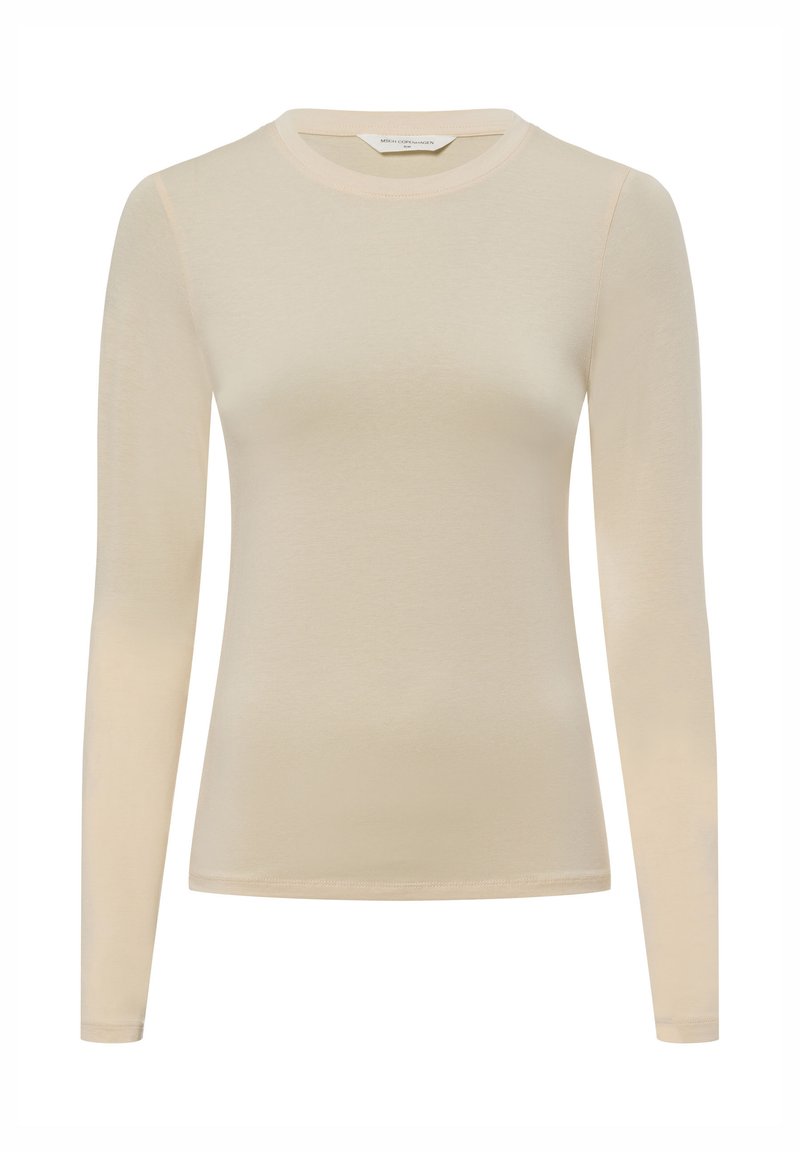 Beige langslipshirt gemaakt van zachte stof met een aansluitend ontwerp en ronde hals. Bevat minimale stiksels en geen zichtbare accenten.