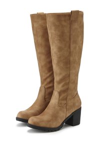 Pair of tan knee-high boots with block heels and pull-on tabs, featuring a smooth suede-like texture and black lug soles.