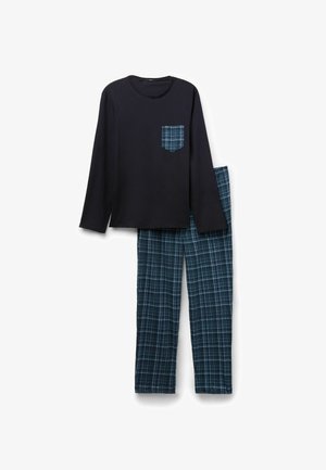 Black long-sleeve top featuring a plaid pocket and matching plaid pajama bottoms in shades of blue and green. Soft cotton fabric, relaxed fit.