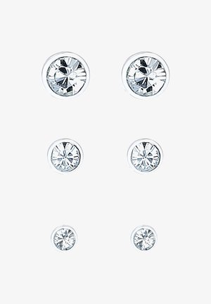 Kolmepoolsete ümmarguste kõrvarõngaste komplekt, millel on selged, faceted kristallid hõbedaste metallraamidega, kolme erineva suurusega: suur, keskmine, väike.