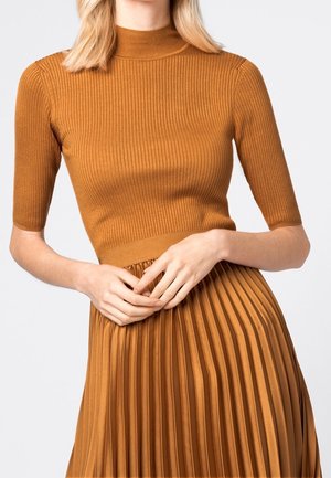 Stickad tröja - light brown