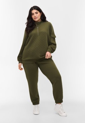 STEPPMUSTER - Trainingsbroek - ivy green