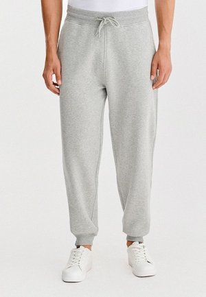 - Spodnie treningowe