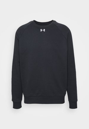 Svart crewneck sweatshirt tillverkad av mjukt material. Har raglanärmar, ribbade muddar och fåll, samt en liten vit logotyp på framsidan.