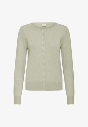 Vaaleanvihreä neuletakki, jossa pitkät hihat, pyöreä pääntie ja napillinen edusta. Valmistettu pehmeästä, hieman teksturoidusta neulemateriaalista.