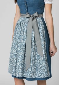 Blue dress with white polka dots on upper bodice and a floral patterned skirt, cinched at the waist with a gray ribbon.