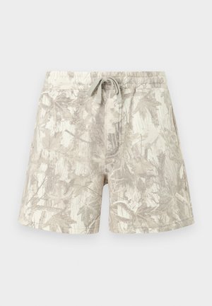 Svetlo bež in sive kratke hlače z vrvico, z rahlim vzorcem kamuflaže listov in vej ter z elastičnim pasom.