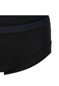 Sorte bomuldsboksershorts med en blød elastisk talje, der har brandnavnet, glat overflade og en tætsiddende pasform designet til komfort.