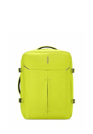 Bright yellow soft-shell suitcase with top handle, side handles, and adjustable side straps, shown upright on a white background.