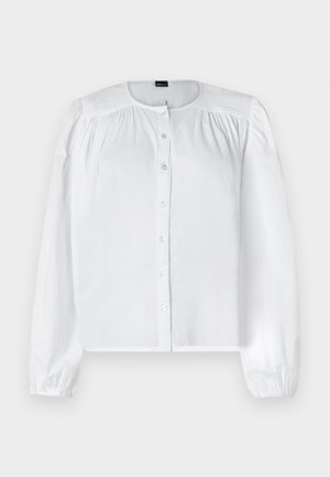 Balta ilga rankovė palaidinė, pagaminta iš lygaus audinio, su mygtukų užsegimu priekyje ir susiraukšlėmis ant pečių, su apvaliu kaklu.